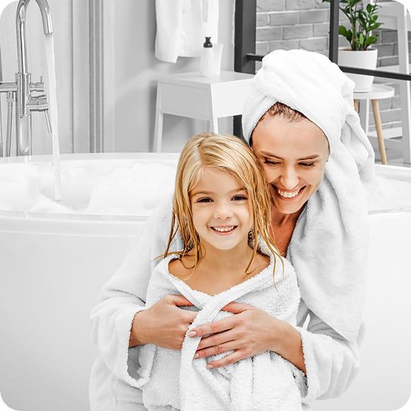 Image of mother and child after enjoying endless hot water from S3